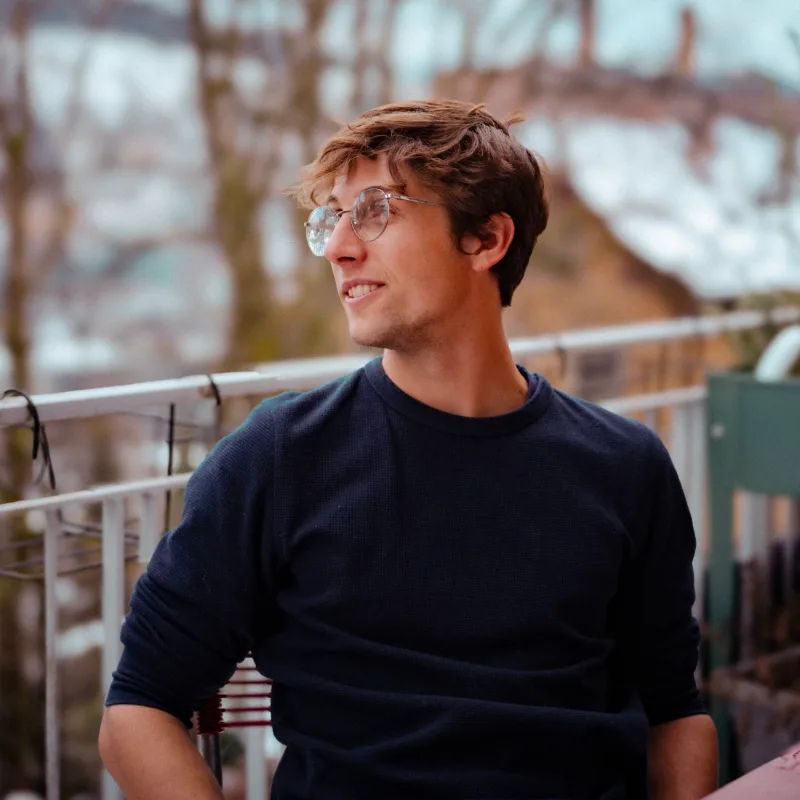 Luke Tornare, smiling and looking to the side